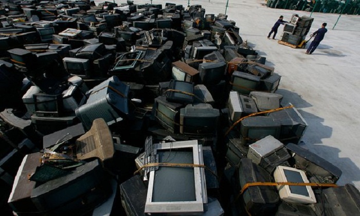 China`s booming middle class drives Asia`s toxic e-waste mountains 